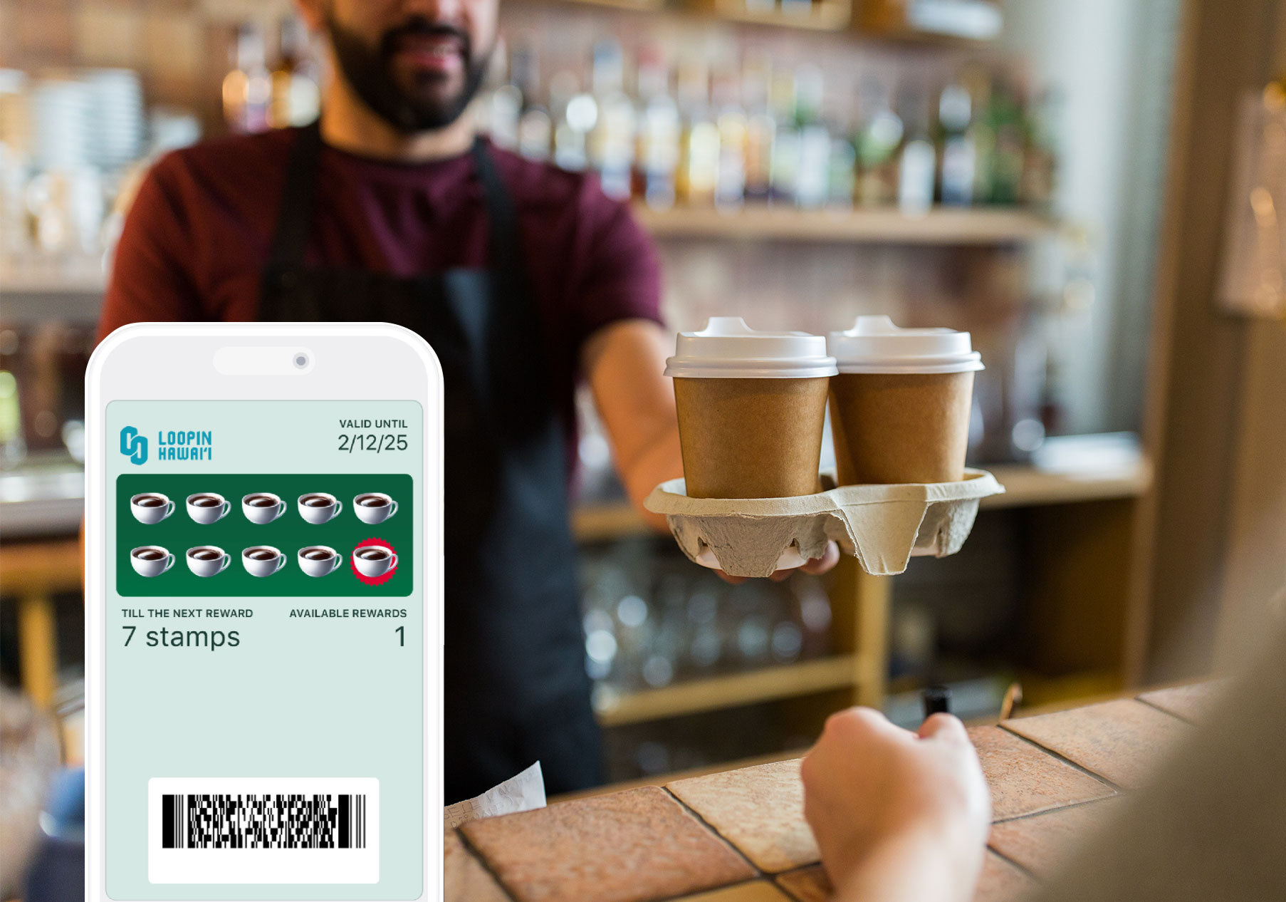 Digital loyalty card on a phone at a coffee shop counter